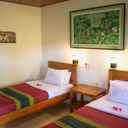 Flamboyan Hotel Кута Екстериор снимка