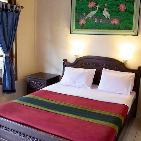 Flamboyan Hotel Кута Екстериор снимка