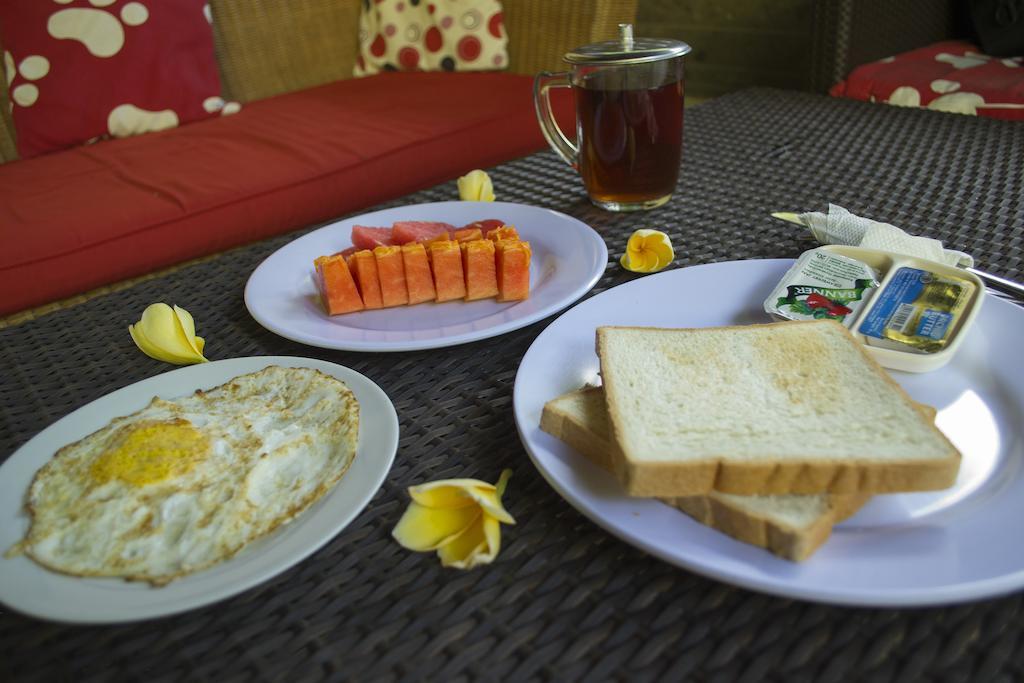 Flamboyan Hotel Кута Екстериор снимка